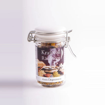 Anti Depression, Räuchermischung der Reihe Kraftvoll Räuchern von Berk, 60 ml im Bügelglas: Bügelglas mit weißem Deckel und Etikett vor hellem Grund