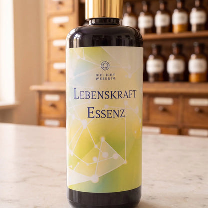 Etikett des Aura Sprays Lebenskraft aus der Nähe: Dodekaeder-Zeichen, Schriftzug Die Lichtweberin, gelbgrüner Farbverlauf