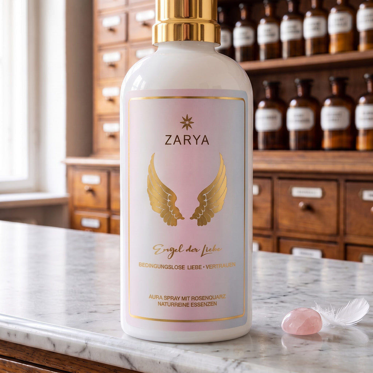 Nahaufnahme des Etiketts: Zarya, goldene Flügel, Engel der Liebe, Aura Spray mit Rosenquarz