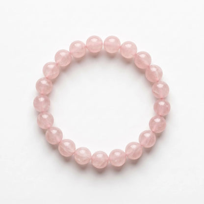 Rosenquarz Armband freigestellt auf Weiß – 8 mm Edelstein-Kugelarmband von Spirit of Gaia
