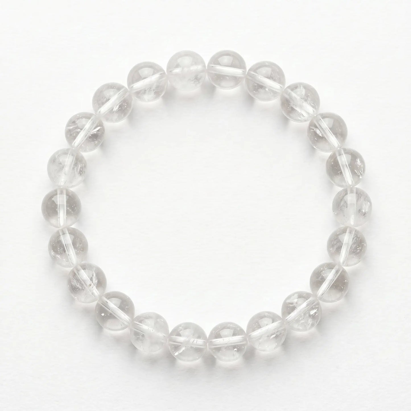 Bergkristall Armband freigestellt auf Weiß – 8 mm Edelstein-Kugelarmband von Spirit of Gaia