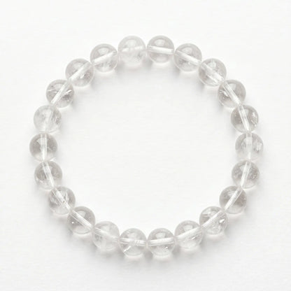 Bergkristall Armband freigestellt auf Weiß – 8 mm Edelstein-Kugelarmband von Spirit of Gaia